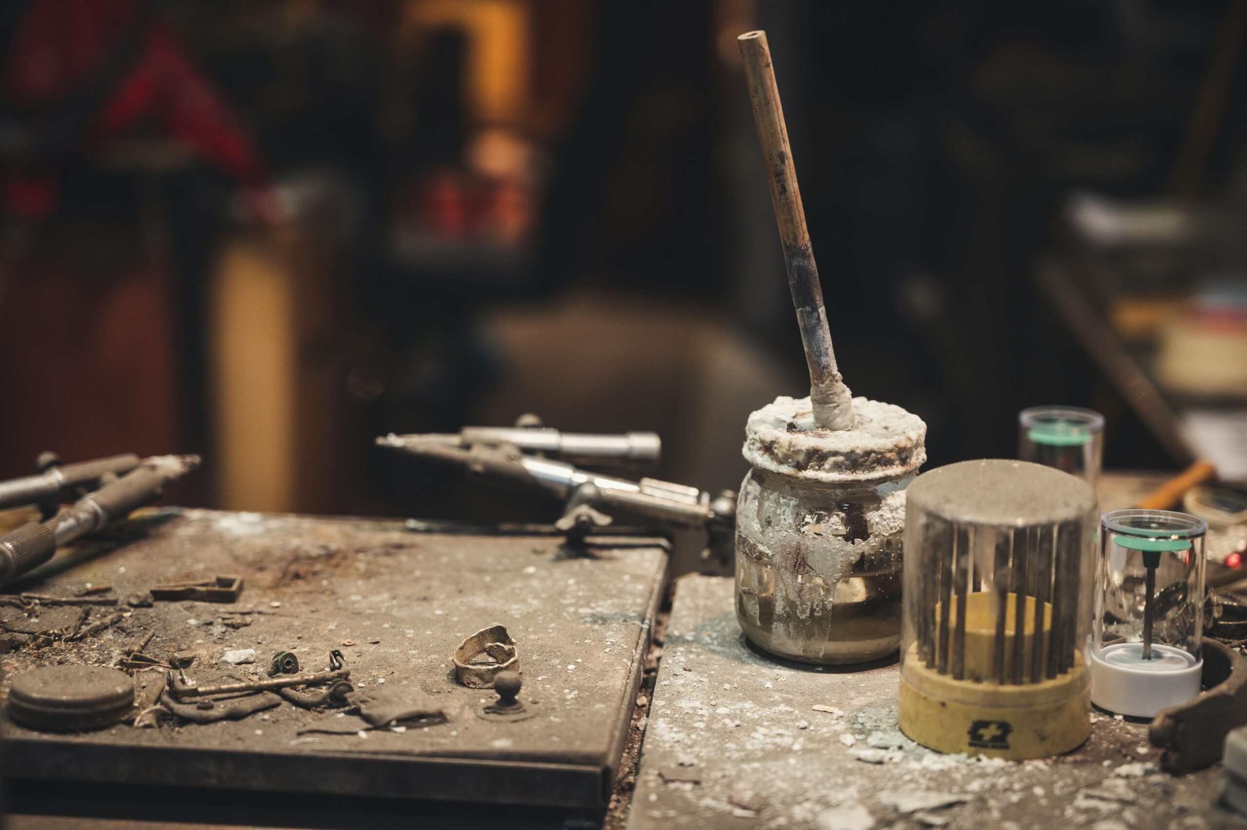 Silver jewelry surface refinement on a silversmithing workbench