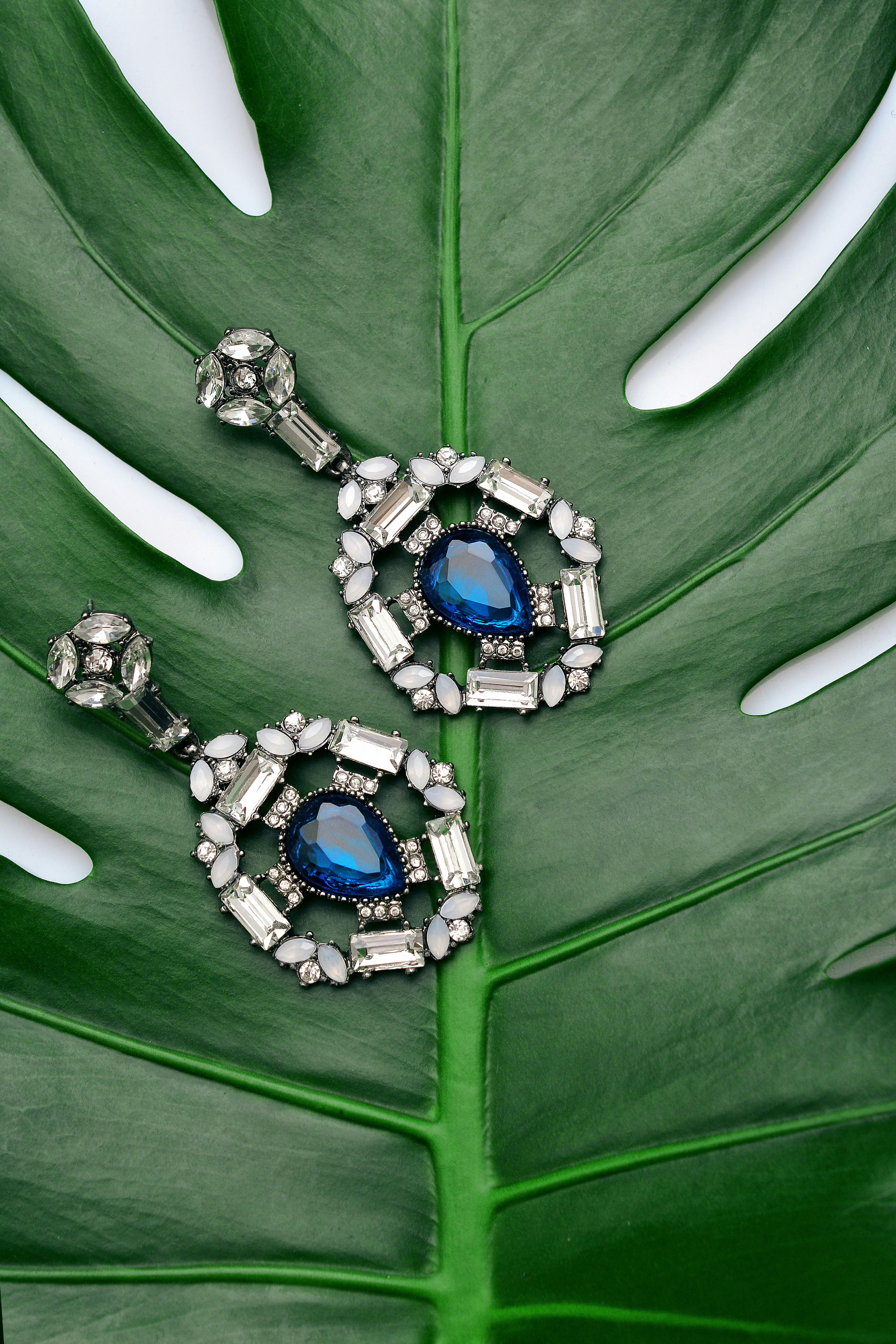 Silver bezel setting around a cabochon stone