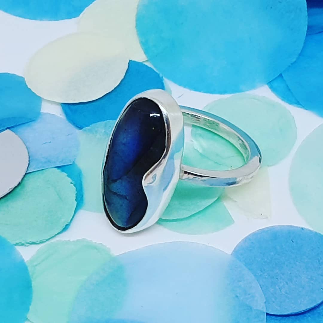 Blue lapis lazuli cabochon gemstone used for jewelry setting