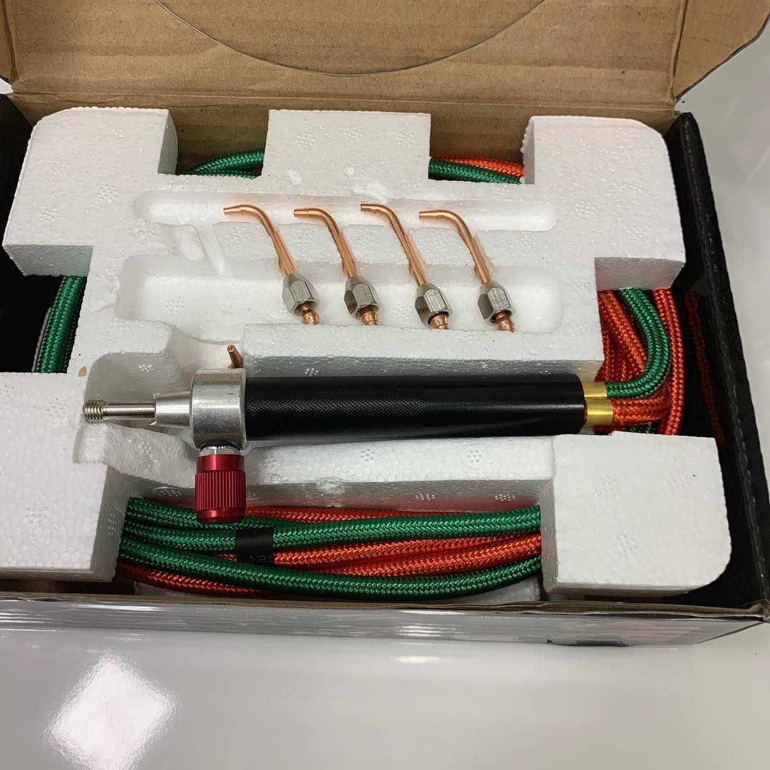 Small jewelry torch used for silver soldering and heat control