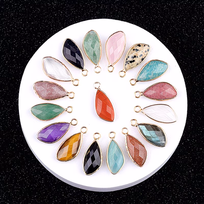 Cabochon stone sitting inside a silver bezel setting