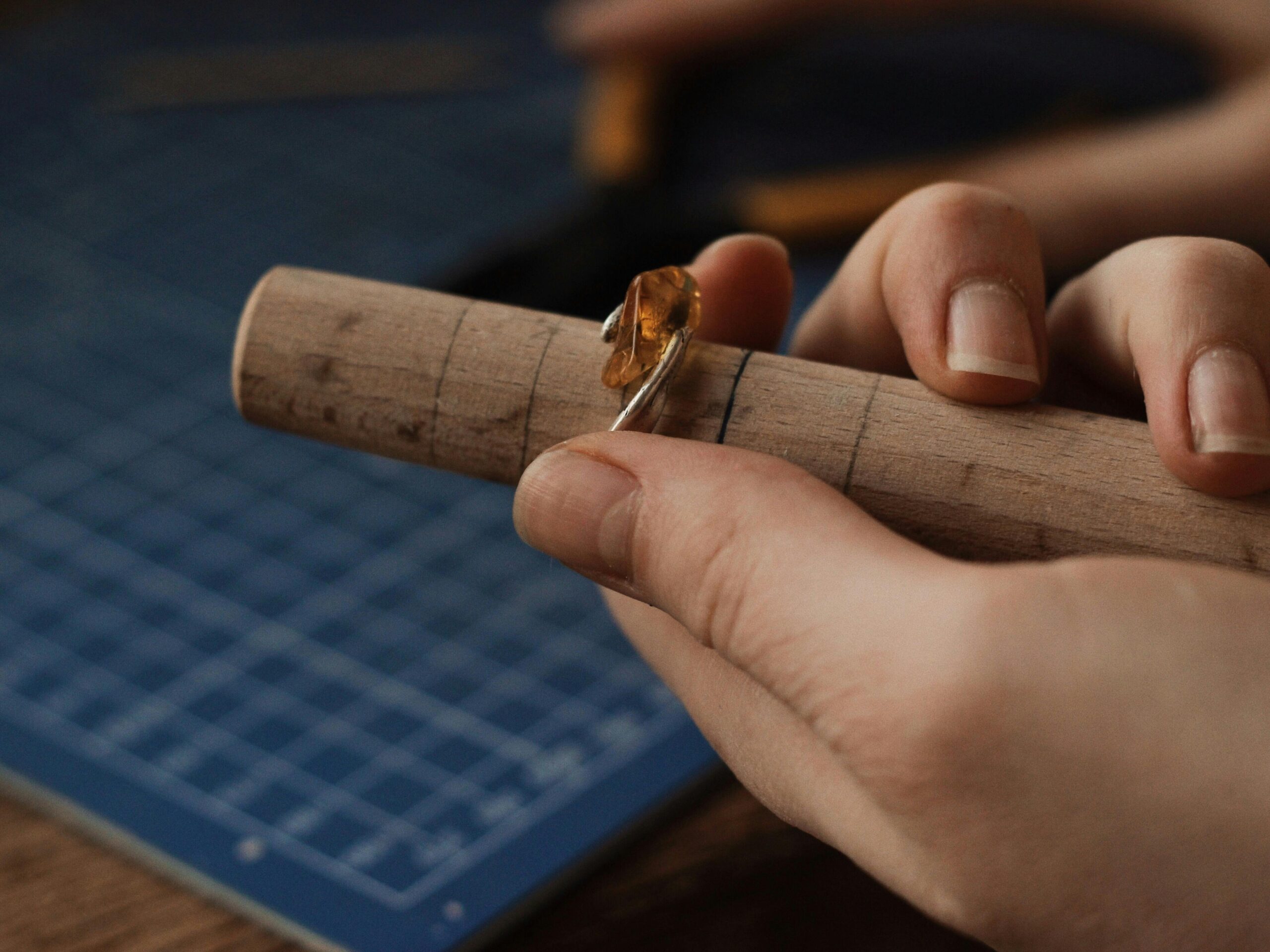 Jewelry measuring tool used to check ring sizing and printed scale accuracy